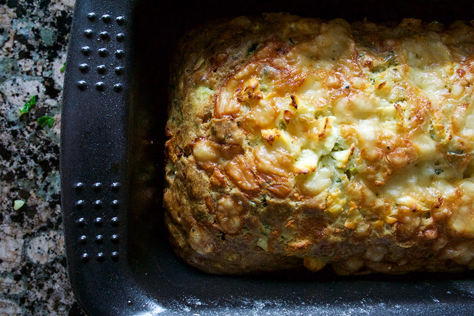 Loaf of zucchini bread in pan